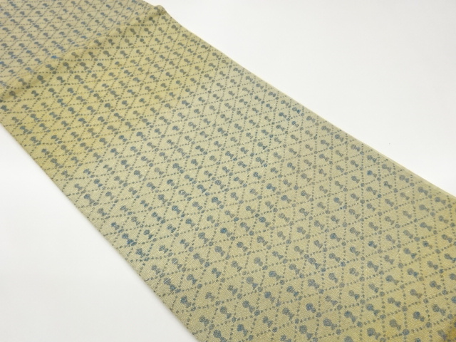 金通し襷に抽象模様織出し袋帯